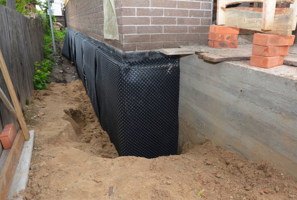 Happy homeowners after waterproofing job in Egg Harbor Township